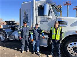 Photo showing EquipmentShare apprentices satanding in front of a delivery truck in Aurora, Colorado. (Photo: EquipmentShare)