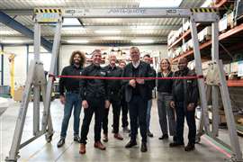 Photo showing the mayor of Dreux, Pierre-Frédéric Billet, officially opening the new LGH site in France. Alongside him at the front is LGH Europe CEO, Andy Mault. (Image: LGH)