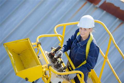 woman operating aerial platform