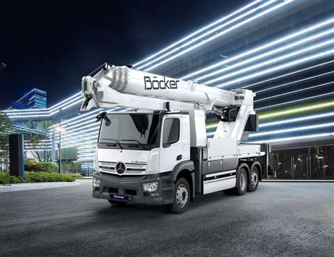 White telescopic crane on a white truck