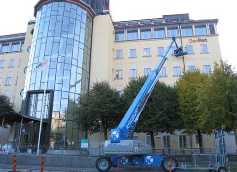 The Genie SX-180 self-propelled telescopic super boom lift at work at the Lindholmen building in Cit