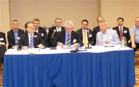 Steve Couling (centre) takes over the IPAF presidency from Wayne Lawson (right) at the IPAF Annual G