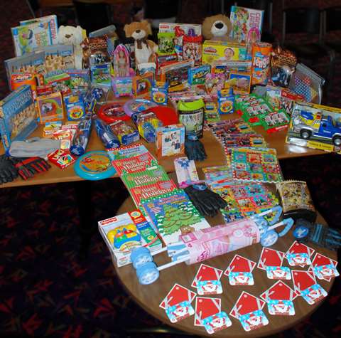 Haulotte Group/BilJax of Archbold, OH teamed up with Nu-Arch Lanes to help raise money for Christmas