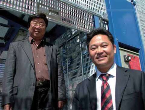 Mr Wang Hua Long, GJJ president (left) with Mr Liu Yue Jin, the company's general manager and chief 