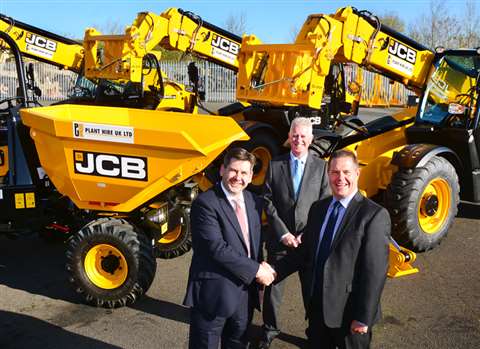 JCB UK &amp; Ireland sales director Dan Thompstone (left) seals the deal with Plant Hire UK (PHUK) M