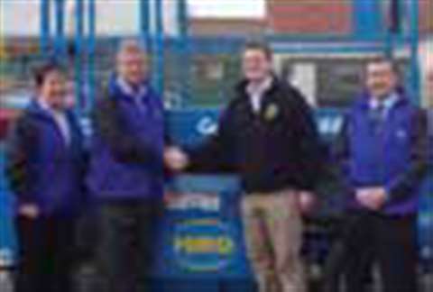 Giles Councell, IPAF audit programme manager, (in black jacket) congratulates (l–r) Emma Raper, Alla