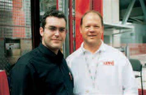 Jason Leibeck (left), president of Avro Hoist, with Randy Lewis, a salesman with Lewis Equipment.